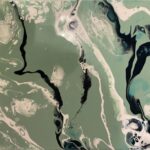 green, black and sandy tones mixed in a marble like pattern